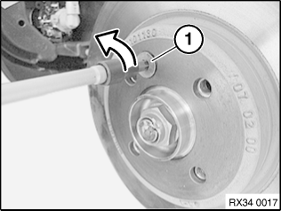 34 11 220 Removing and installing/replacing both front brake discs