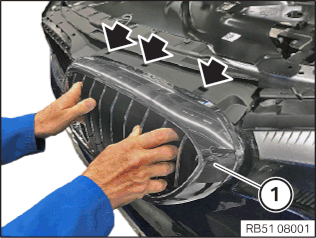 Removing and installing ornamental grille in front bumper panel (left ...